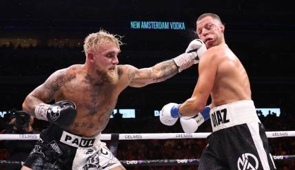 Aug 5, 2023; Dallas, Texas, USA;  Jake Paul (left) fights  against Nate Diaz in a boxing match at American Airlines Center. Mandatory Credit: Kevin Jairaj-USA TODAY Sports