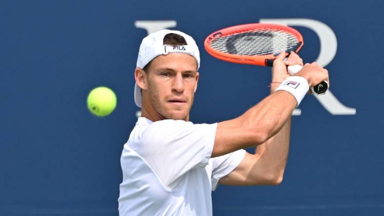 Aug 5, 2023; Toronto, Ontario, Canada;  Diego Schwartzman (ARG) plays a shot against Liam Draxl (CAN) during qualifying play for the National Bank Open at Sobeys Stadium. Mandatory Credit: Dan Hamilton-USA TODAY Sports