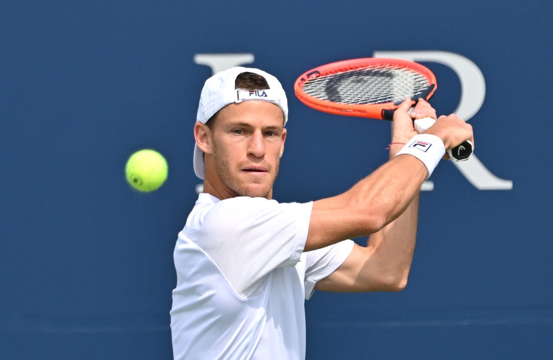 Aug 5, 2023; Toronto, Ontario, Canada;  Diego Schwartzman (ARG) plays a shot against Liam Draxl (CAN) during qualifying play for the National Bank Open at Sobeys Stadium. Mandatory Credit: Dan Hamilton-USA TODAY Sports