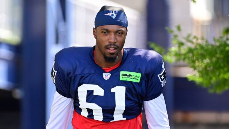 Aug 2, 2023; Foxborough, MA, USA; New England Patriots cornerback Ameer Speed (61) heads to the practice fields at Gillette Stadium. Mandatory Credit: Eric Canha-USA TODAY Sports