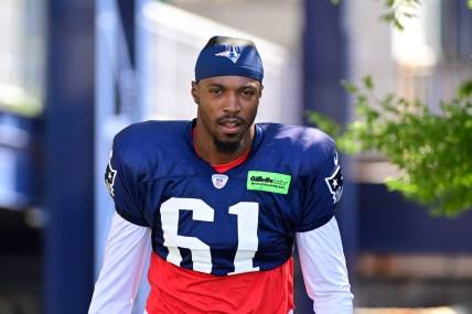 Aug 2, 2023; Foxborough, MA, USA; New England Patriots cornerback Ameer Speed (61) heads to the practice fields at Gillette Stadium. Mandatory Credit: Eric Canha-USA TODAY Sports