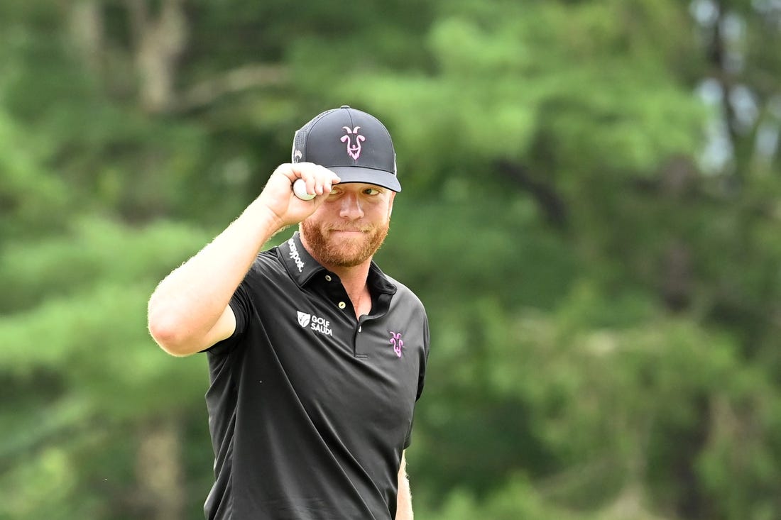 Aug 6, 2023; White Sulphur Springs, West Virginia, USA; Taylor Gooch on the 10th green during the final round of the LIV Golf event at The Old White Course. Mandatory Credit: Bob Donnan-USA TODAY Sports