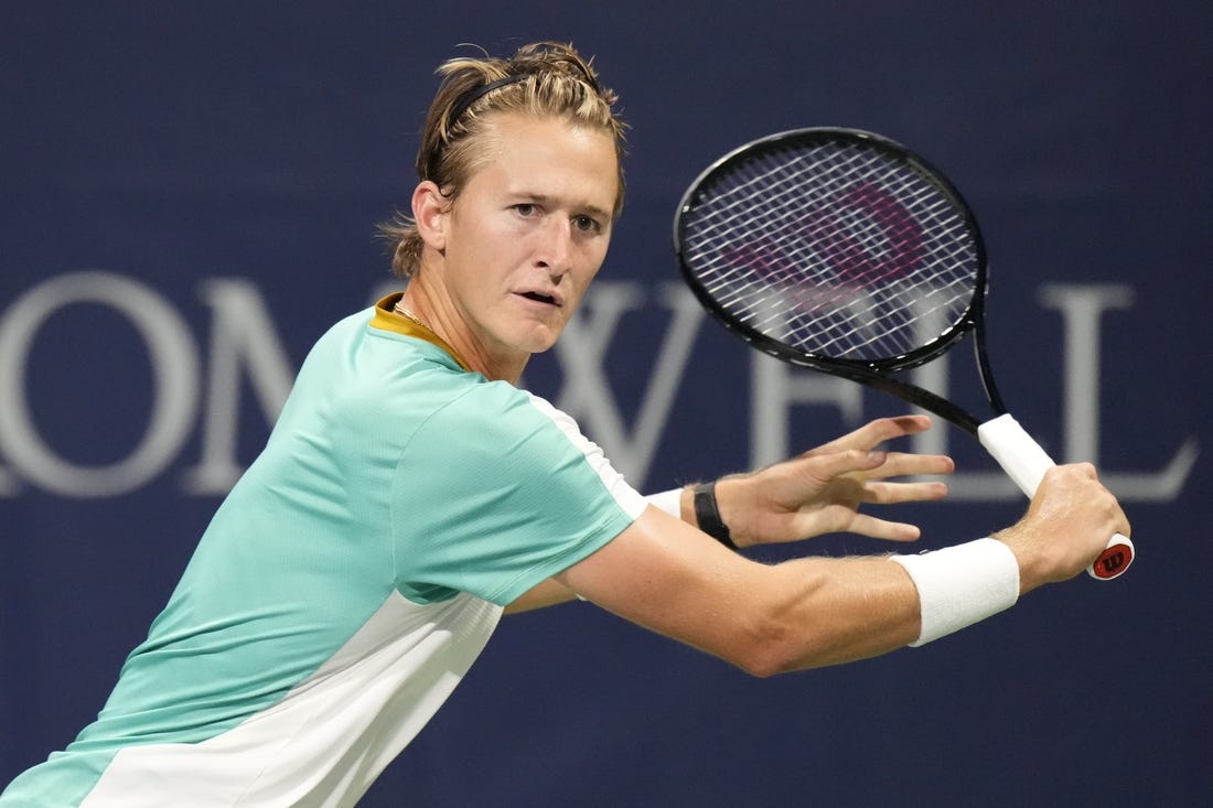 Aug 9, 2023; Toronto, Ontario, Canada; Sebastian Korda (USA) chases a ball hit by Aleksandar Vukic (not pictured) at Sobeys Stadium. Mandatory Credit: John E. Sokolowski-USA TODAY Sports