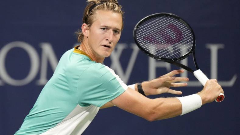 Aug 9, 2023; Toronto, Ontario, Canada; Sebastian Korda (USA) chases a ball hit by Aleksandar Vukic (not pictured) at Sobeys Stadium. Mandatory Credit: John E. Sokolowski-USA TODAY Sports