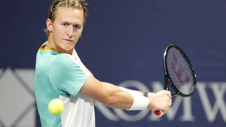 Aug 9, 2023; Toronto, Ontario, Canada; Sebastian Korda (USA) follows a ball hit by Aleksandar Vukic (not pictured) at Sobeys Stadium. Mandatory Credit: John E. Sokolowski-USA TODAY Sports