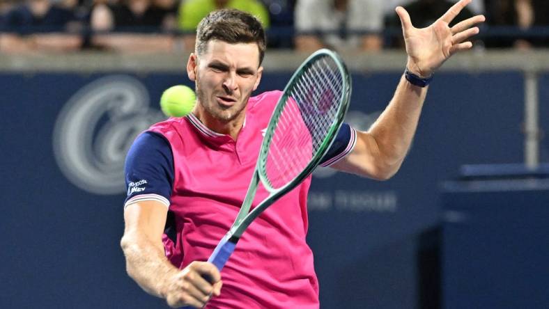 Aug 10, 2023; Toronto, Ontario, Canada; Hubert Hurkacz (POL)  plays a shot against Carlos Alcaraz (ESP) (not pictured) in third round play at Sobeys Stadium. Mandatory Credit: Dan Hamilton-USA TODAY Sports