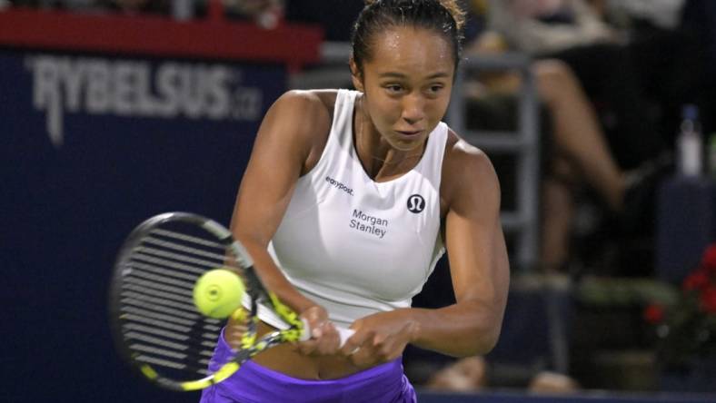 Aug 10, 2023; Montreal, Quebec, Canada; Leylah Fernandez (CAN) hits a backhand against Danielle Collins (USA) (not pictured) during third round play at IGA Stadium. Mandatory Credit: Eric Bolte-USA TODAY Sports