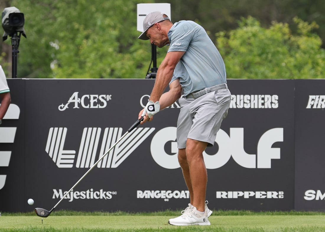 Aug 12, 2023; Bedminster, New Jersey, USA; Bryson DeChambeau plays his shot from the ninth tee during the second round of the LIV Golf Bedminster golf tournament at Trump National Bedminster. Mandatory Credit: Vincent Carchietta-USA TODAY Sports