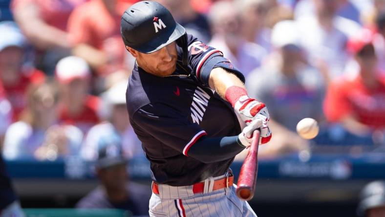 Aug 13, 2023; Philadelphia, Pennsylvania, USA; Minnesota Twins left fielder Jordan Luplow (16) hits a home run during the first inning against the Philadelphia Phillies at Citizens Bank Park. Mandatory Credit: Bill Streicher-USA TODAY Sports