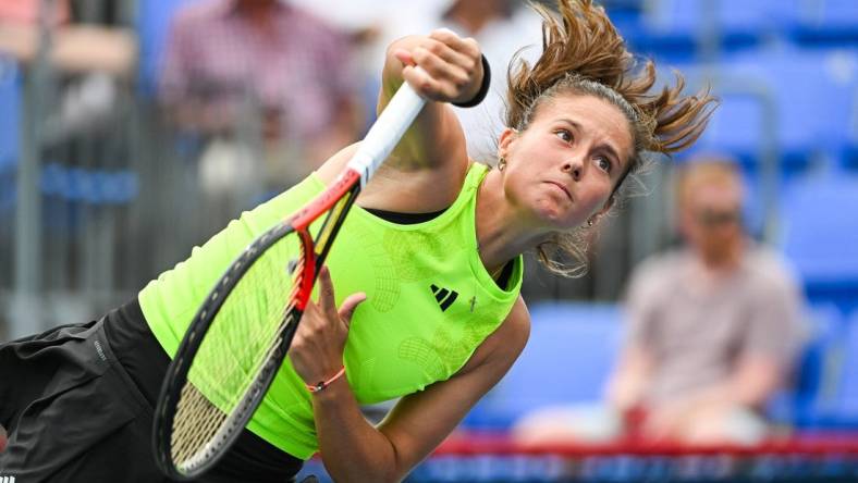 Aug 10, 2023; Montreal, Quebec, Canada; Daria Kasatkina serves the ball to Marie Bouzkova (CZE) (not pictured) during third round play at IGA Stadium. Mandatory Credit: David Kirouac-USA TODAY Sports