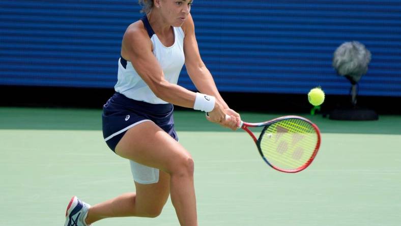 Jasmine Paolini of Italy makes a hit to Coco Gauff of the U.S. during the quarterfinals of the Western & Southern Open at the Lindner Family Tennis Center in Mason Friday, August, 18, 2023.