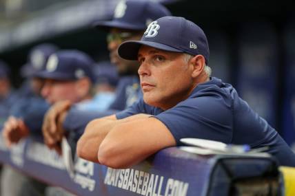 Aug 24, 2023; St. Petersburg, Florida, USA;  Tampa Bay Rays manager Kevin Cash (16) looks on from the dugout against the Colorado Rockies in the third inning at Tropicana Field. Mandatory Credit: Nathan Ray Seebeck-USA TODAY Sports