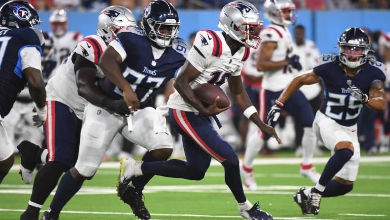 Aug 25, 2023; Nashville, Tennessee, USA; New England Patriots quarterback Malik Cunningham (16) runs for a short gain during the second half against the Tennessee Titans at Nissan Stadium. Mandatory Credit: Christopher Hanewinckel-USA TODAY Sports