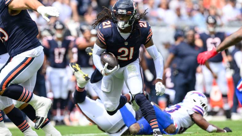 Aug 26, 2023; Chicago, Illinois, USA; Chicago Bears running back D'Onta Foreman (21) runs the ball against the Buffalo Bills during the second quarter at Soldier Field. Mandatory Credit: Daniel Bartel-USA TODAY Sports