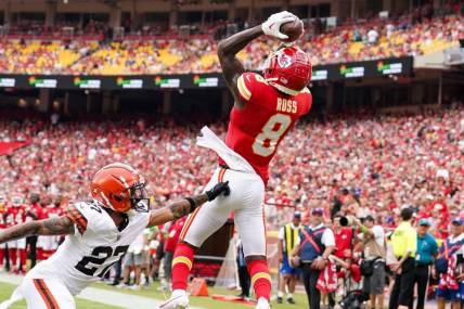 Aug 26, 2023; Kansas City, Missouri, USA; Kansas City Chiefs wide receiver Justyn Ross (8) catches a pass for a touchdown against Cleveland Browns cornerback Lorenzo Burns (27) during the first half at GEHA Field at Arrowhead Stadium. Mandatory Credit: Denny Medley-USA TODAY Sports