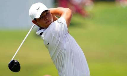 Aug 26, 2023; Atlanta, Georgia, USA; Tom Kim plays his shot from the fourth tee during the third round of the TOUR Championship golf tournament at East Lake Golf Club. Mandatory Credit: John David Mercer-USA TODAY Sports