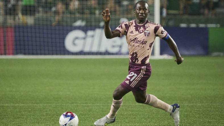 Aug 26, 2023; Portland, Oregon, USA; Portland Timbers midfielder Diego Chara (21) controls the ball during the second half against the Vancouver Whitecaps at Providence Park. Mandatory Credit: Troy Wayrynen-USA TODAY Sports