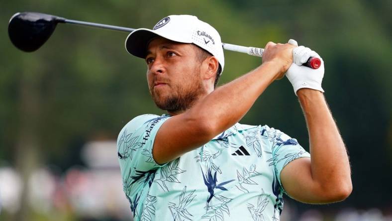 Aug 27, 2023; Atlanta, Georgia, USA; Xander Schauffele plays his shot from the sixth tee during the final round of the TOUR Championship golf tournament at East Lake Golf Club. Mandatory Credit: John David Mercer-USA TODAY Sports