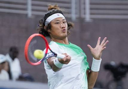 Aug 30, 2023; Flushing, NY, USA; Zhizhen Zhang of China hits to Casper Ruud of Norway on day three of the 2023 U.S. Open Tennis Championships at USTA Billie Jean King National Tennis Center. Mandatory Credit: Danielle Parhizkaran-USA TODAY Sports