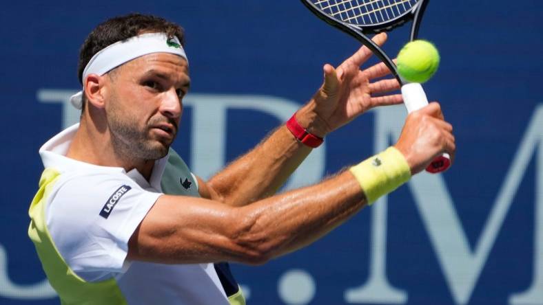 Aug 31, 2023; Flushing, NY, USA; Grigor Dimitrov of Bulgaria hits to Andy Murray of Great Britain on day four of the 2023 U.S. Open tennis tournament at USTA Billie Jean King National Tennis Center. Mandatory Credit: Robert Deutsch-USA TODAY Sports