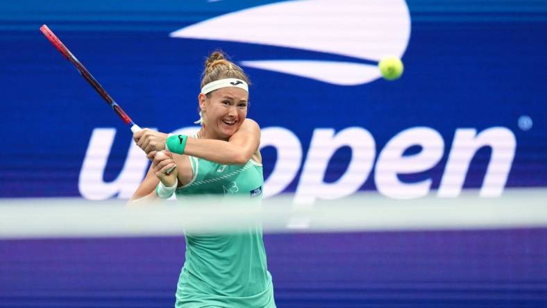 Sep 2, 2023; Flushing, NY, USA; Marie Bouzkova of Czech Republic hits to Ons Jabeur of Tunisia on day six of the 2023 U.S. Open tennis tournament at USTA Billie Jean King National Tennis Center. Mandatory Credit: Danielle Parhizkaran-USA TODAY Sports