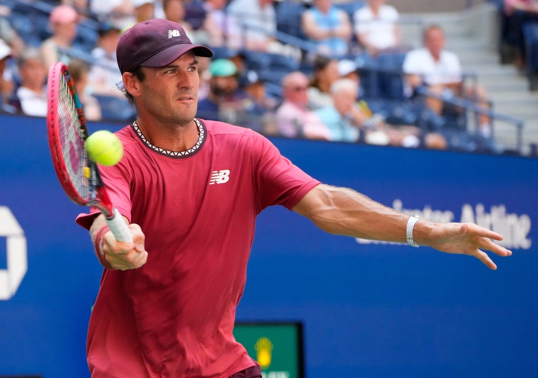 Sept 3, 2023; Flushing, NY, USA; Tommy Paul of the USA hits to Ben Shelton of the USA on day seven of the 2023 U.S. Open tennis tournament at USTA Billie Jean King National Tennis Center. Mandatory Credit: Robert Deutsch-USA TODAY Sports