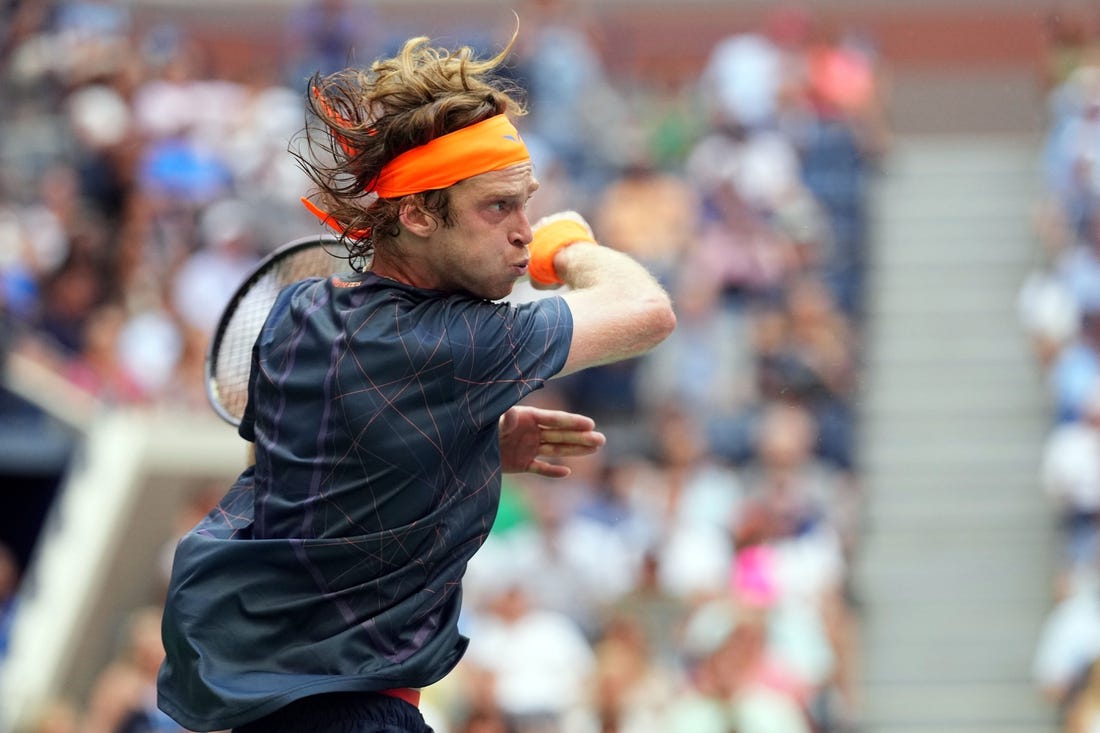 Sep 6, 2023; Flushing, NY, USA; Andrey Rublev hits to Daniil Medvedev on day ten of the 2023 U.S. Open tennis tournament at USTA Billie Jean King National Tennis Center. Mandatory Credit: Danielle Parhizkaran-USA TODAY Sports