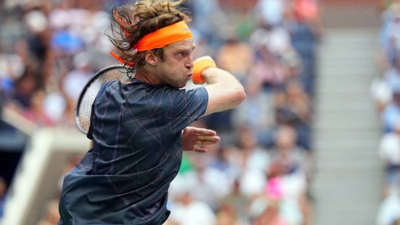 Sep 6, 2023; Flushing, NY, USA; Andrey Rublev hits to Daniil Medvedev on day ten of the 2023 U.S. Open tennis tournament at USTA Billie Jean King National Tennis Center. Mandatory Credit: Danielle Parhizkaran-USA TODAY Sports