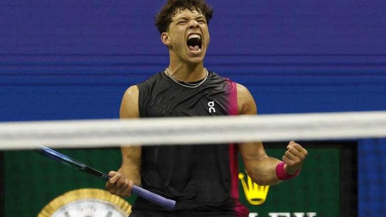 Sep 8, 2023; Flushing, NY, USA; Ben Shelton of the United States reacts after winning a point against Novak Djokovic of Serbia (not pictured) in a men's singles semifinal on day twelve of the 2023 U.S. Open tennis tournament at USTA Billie Jean King Tennis Center. Mandatory Credit: Geoff Burke-USA TODAY Sports