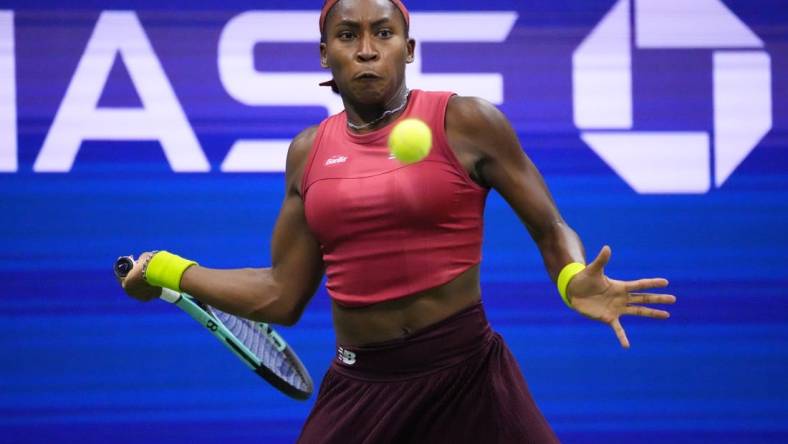 Sep 9, 2023; Flushing, NY, USA; Coco Gauff of the United States hits a forehand against Aryna Sabalenka (not pictured) in the women's singles final on day thirteen of the 2023 U.S. Open tennis tournament at USTA Billie Jean King Tennis Center. Mandatory Credit: Robert Deutsch-USA TODAY Sports