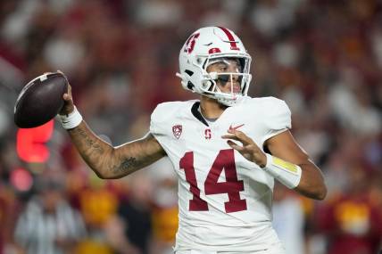 Sep 9, 2023; Los Angeles, California, USA; Stanford Cardinal quarterback Ashton Daniels (14) throws the ball against the Southern California Trojans in the first half at United Airlines Field at Los Angeles Memorial Coliseum. Mandatory Credit: Kirby Lee-USA TODAY Sports