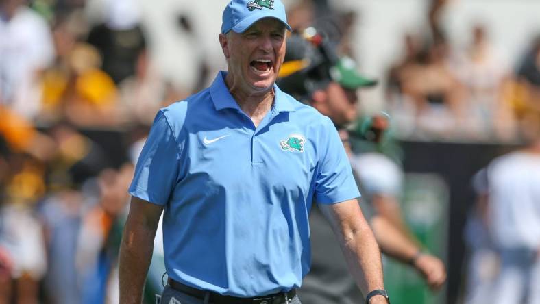 Sep 16, 2023; Hattiesburg, Mississippi, USA; Tulane Green Wave coach Willie Fritz yells to his players before their game against the Southern Miss Golden Eagles at M.M. Roberts Stadium. Mandatory Credit: Chuck Cook-USA TODAY Sports