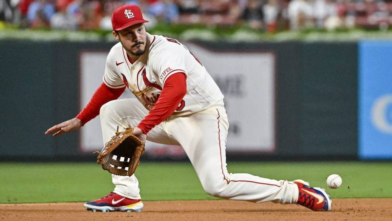 Sep 16, 2023; St. Louis, Missouri, USA;  St. Louis Cardinals third baseman Nolan Arenado (28) fields a ground ball against the Philadelphia Phillies during the fifth inning at Busch Stadium. Mandatory Credit: Jeff Curry-USA TODAY Sports