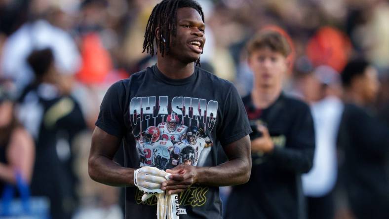 Sep 16, 2023; Boulder, Colorado, USA; Colorado Buffaloes cornerback Travis Hunter (12) warms up prior to the game against the Colorado State Rams at Folsom Field. Mandatory Credit: Andrew Wevers-USA TODAY Sports