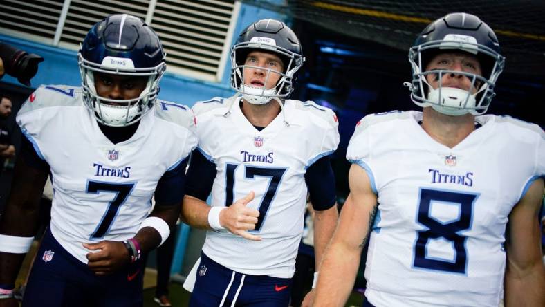 Tennessee Titans quarterbacks Malik Willis (7), Ryan Tannehill (17) and Will Levis (8) head to the field face the Los Angeles Chargers at Nissan Stadium in Nashville, Tenn., Sunday, Sept. 17, 2023.