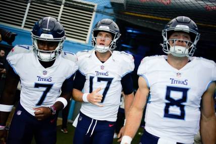 Tennessee Titans quarterbacks Malik Willis (7), Ryan Tannehill (17) and Will Levis (8) head to the field face the Los Angeles Chargers at Nissan Stadium in Nashville, Tenn., Sunday, Sept. 17, 2023.