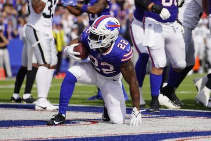 Sep 17, 2023; Orchard Park, New York, USA; Buffalo Bills running back Damien Harris (22) reacts to scoring a touchdown against the Las Vegas Raiders during the second half at Highmark Stadium. Mandatory Credit: Gregory Fisher-USA TODAY Sports