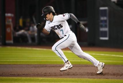 Arizona Diamondbacks Corbin Carroll (7) steals second base which is his 49th stolen base of his rookie season against the San Francisco Giants in the first inning at Chase Field in Phoenix on Sept. 20, 2023.