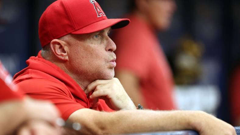 Sep 21, 2023; St. Petersburg, Florida, USA; Los Angeles Angels manager Phil Nevin looks on against the Tampa Bay Rays during the ninth inning at Tropicana Field. Mandatory Credit: Kim Klement Neitzel-USA TODAY Sports