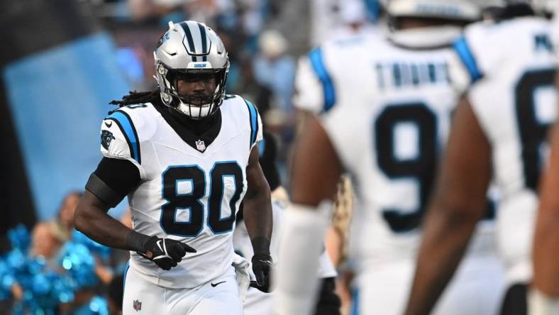 Sep 18, 2023; Charlotte, North Carolina, USA; Carolina Panthers tight end Ian Thomas (80) runs on to the field before the game at Bank of America Stadium. Mandatory Credit: Bob Donnan-USA TODAY Sports