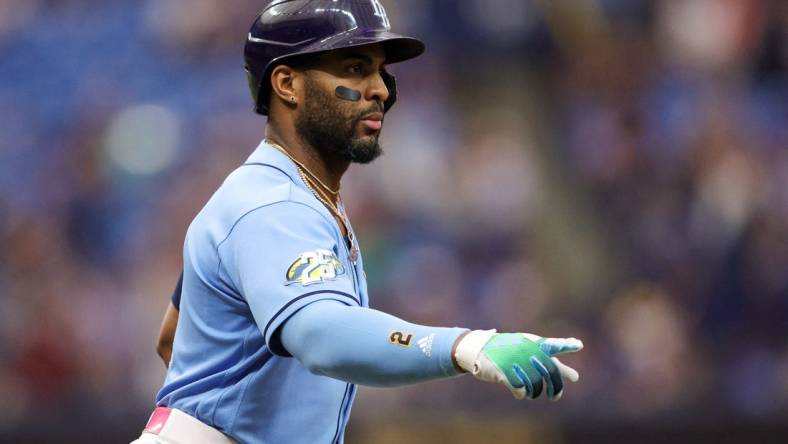 Sep 23, 2023; St. Petersburg, Florida, USA;  Tampa Bay Rays first baseman Yandy Diaz (2) celebrates after hitting a solo home run against the Toronto Blue Jays in the first inning at Tropicana Field. Mandatory Credit: Nathan Ray Seebeck-USA TODAY Sports