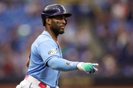 Sep 23, 2023; St. Petersburg, Florida, USA;  Tampa Bay Rays first baseman Yandy Diaz (2) celebrates after hitting a solo home run against the Toronto Blue Jays in the first inning at Tropicana Field. Mandatory Credit: Nathan Ray Seebeck-USA TODAY Sports