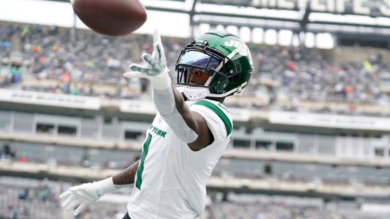 New York Jets cornerback Sauce Gardner (1) catches the ball during warmups before the Jets take on the New England Patriots at MetLife Stadium on Sunday, Sept. 24, 2023, in East Rutherford.