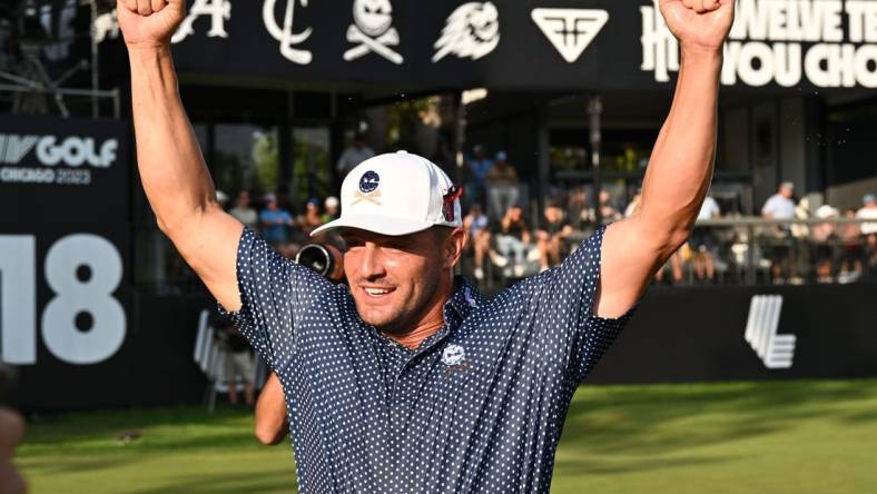 Sep 24, 2023; Sugar Grove, Illinois, USA; Bryson DeChambeau is celebrates after winning the LIV Golf Chicago golf tournament at Rich Harvest Farms. Mandatory Credit: Jamie Sabau-USA TODAY Sports