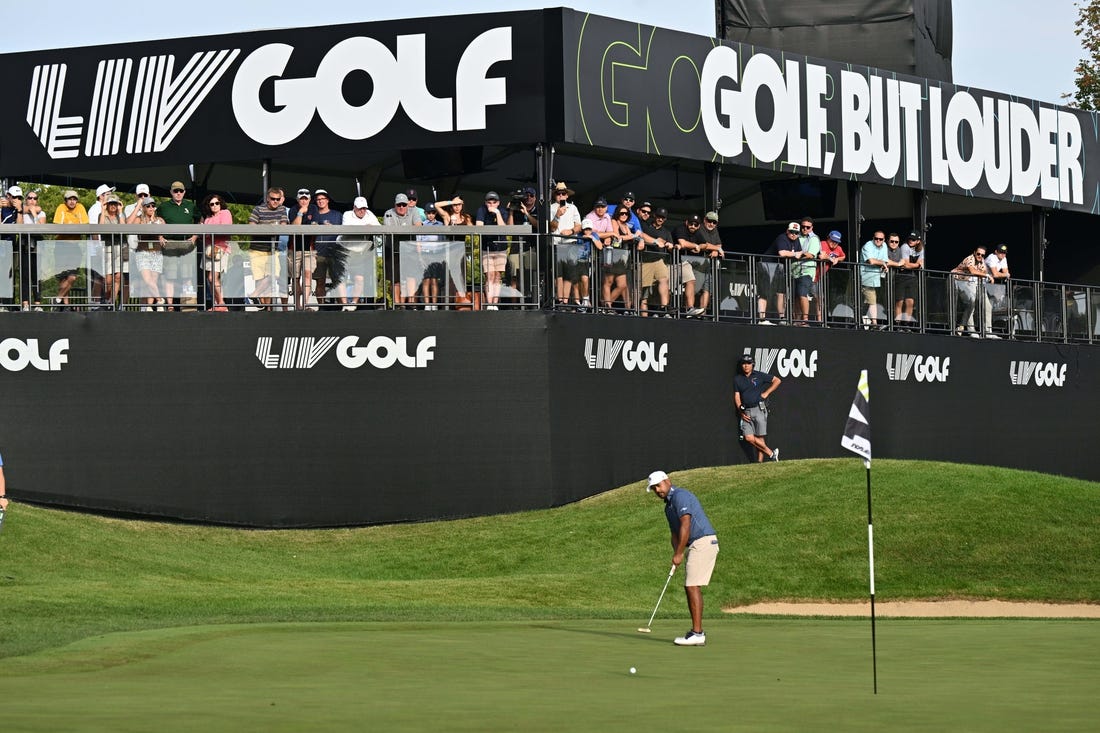 Sep 24, 2023; Sugar Grove, Illinois, USA; Anirban Lahiri putts on the 16th green during the final round of the LIV Golf Chicago golf tournament at Rich Harvest Farms. Mandatory Credit: Jamie Sabau-USA TODAY Sports