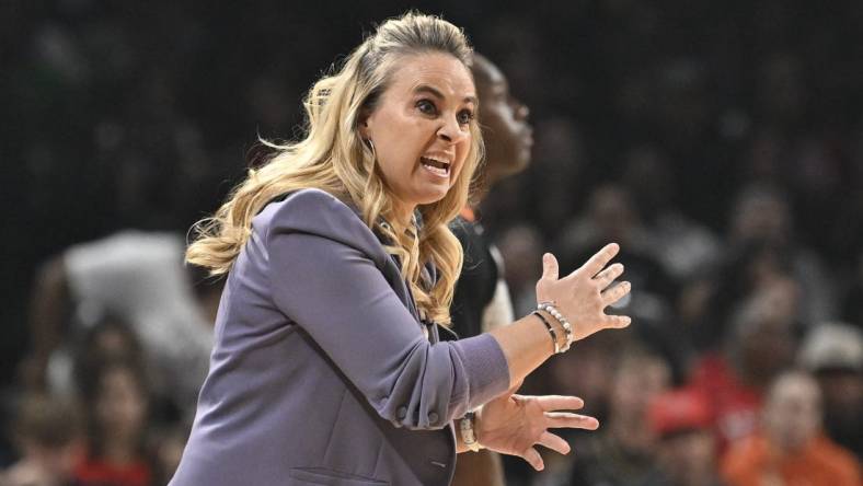 Sep 26, 2023; Las Vegas, Nevada, USA; Las Vegas Aces head coach Becky Hammon gestures to players on the court in the first half against the Dallas Wings during game two of the 2023 WNBA Playoffs at Michelob Ultra Arena. Mandatory Credit: Candice Ward-USA TODAY Sports