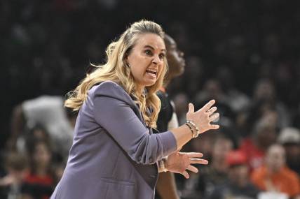 Sep 26, 2023; Las Vegas, Nevada, USA; Las Vegas Aces head coach Becky Hammon gestures to players on the court in the first half against the Dallas Wings during game two of the 2023 WNBA Playoffs at Michelob Ultra Arena. Mandatory Credit: Candice Ward-USA TODAY Sports