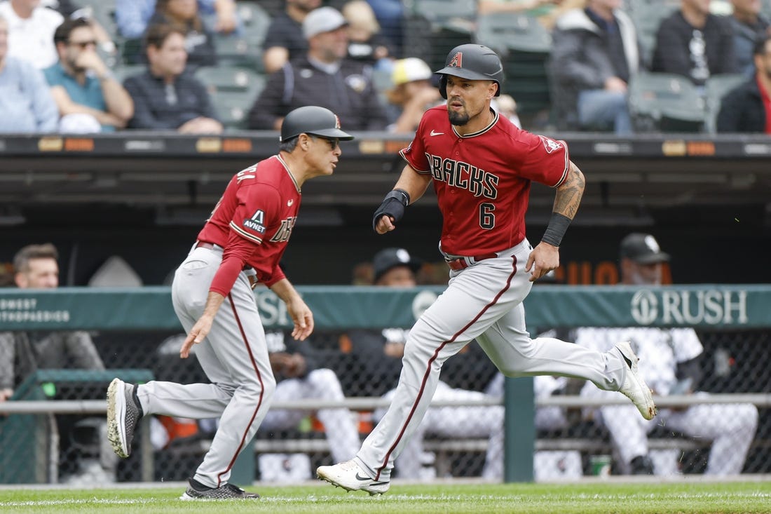 Sep 27, 2023; Chicago, Illinois, USA; Arizona Diamondbacks third baseman Jace Peterson (6) runs to score against the Chicago White Sox during the third inning at Guaranteed Rate Field. Mandatory Credit: Kamil Krzaczynski-USA TODAY Sports