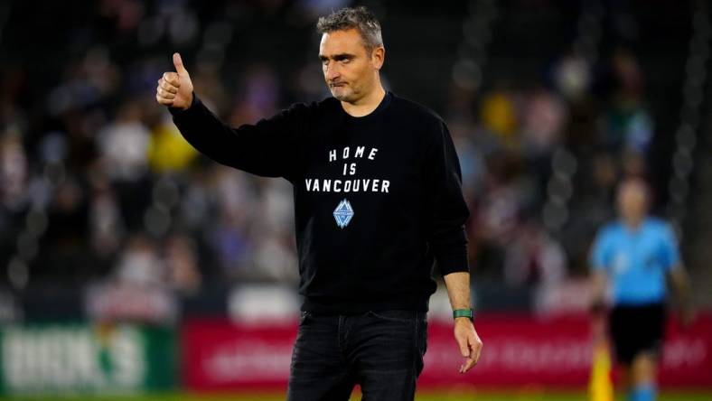 Sep 27, 2023; Commerce City, Colorado, USA; Vancouver Whitecaps FC head coach Vanni Sartini reacts in the first half against the Colorado Rapids at Dick's Sporting Goods Park. Mandatory Credit: Ron Chenoy-USA TODAY Sports