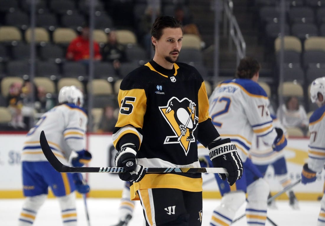 Sep 28, 2023; Pittsburgh, Pennsylvania, USA; Pittsburgh Penguins defenseman Erik Karlsson (65) warms up before the game against the Buffalo Sabres at PPG Paints Arena. Mandatory Credit: Charles LeClaire-USA TODAY Sports